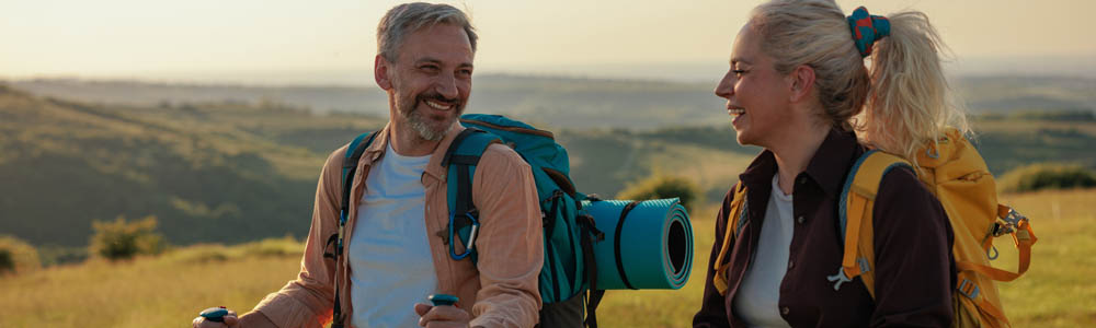 Middle aged couple out hiking